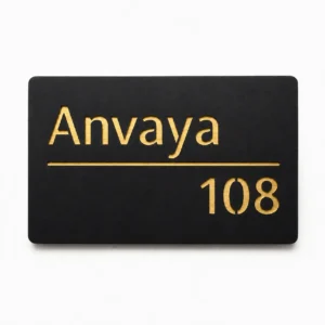 Personalised hollow-cut acrylic name plate with matte black 2 mm top layer and shiny brushed gold 1.5 mm ABS backing