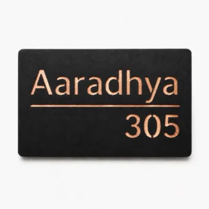 Personalised hollow-cut acrylic name plate with matte black 2 mm top layer and shiny brushed rose gold 1.5 mm ABS backing