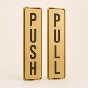 Brushed gold vertical PUSH and PULL ABS door sign pair with rounded laser-cut corners