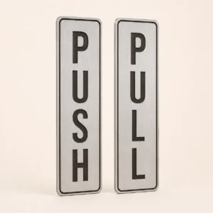 Brushed silver vertical PUSH and PULL ABS door sign pair with rounded laser-cut corners