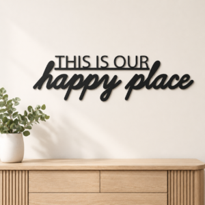 This Is Our Happy Place MDF wall art in matte black finish on an interior wall