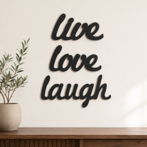 Live Love Laugh MDF wall art in matte black finish displayed on a modern interior wall