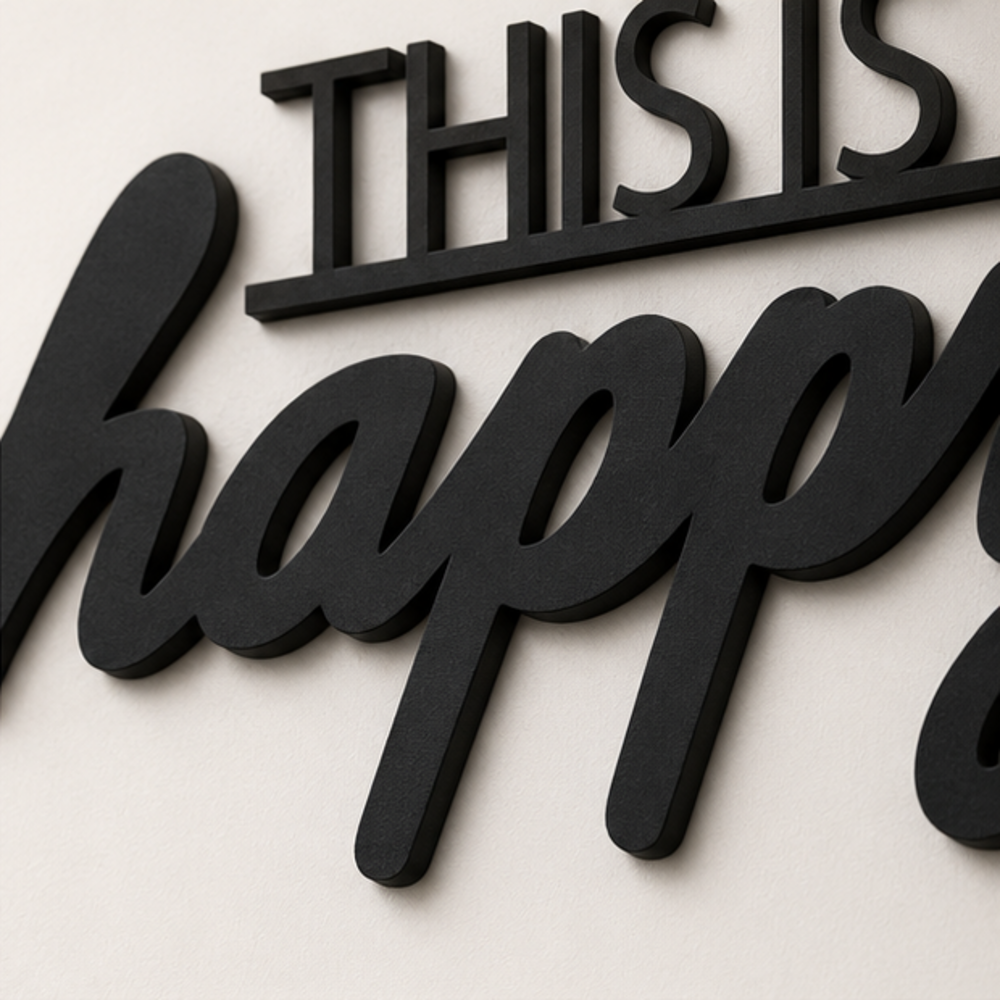 Close-up of This Is Our Happy Place MDF lettering and laser-cut edges