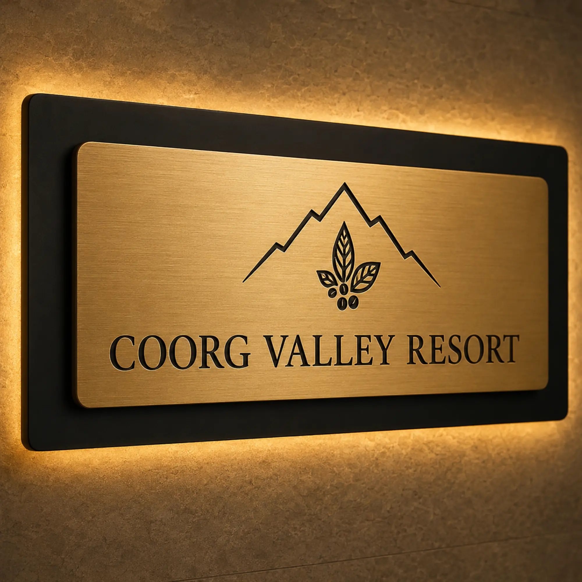 Close-up of engraved lettering and brushed gold finish on a resort reception sign