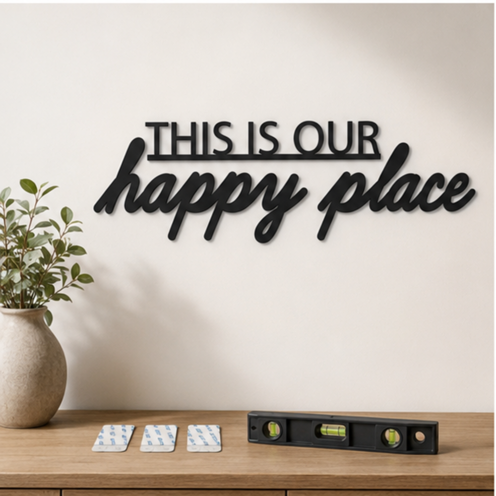 This Is Our Happy Place MDF wall art installation using tape and level