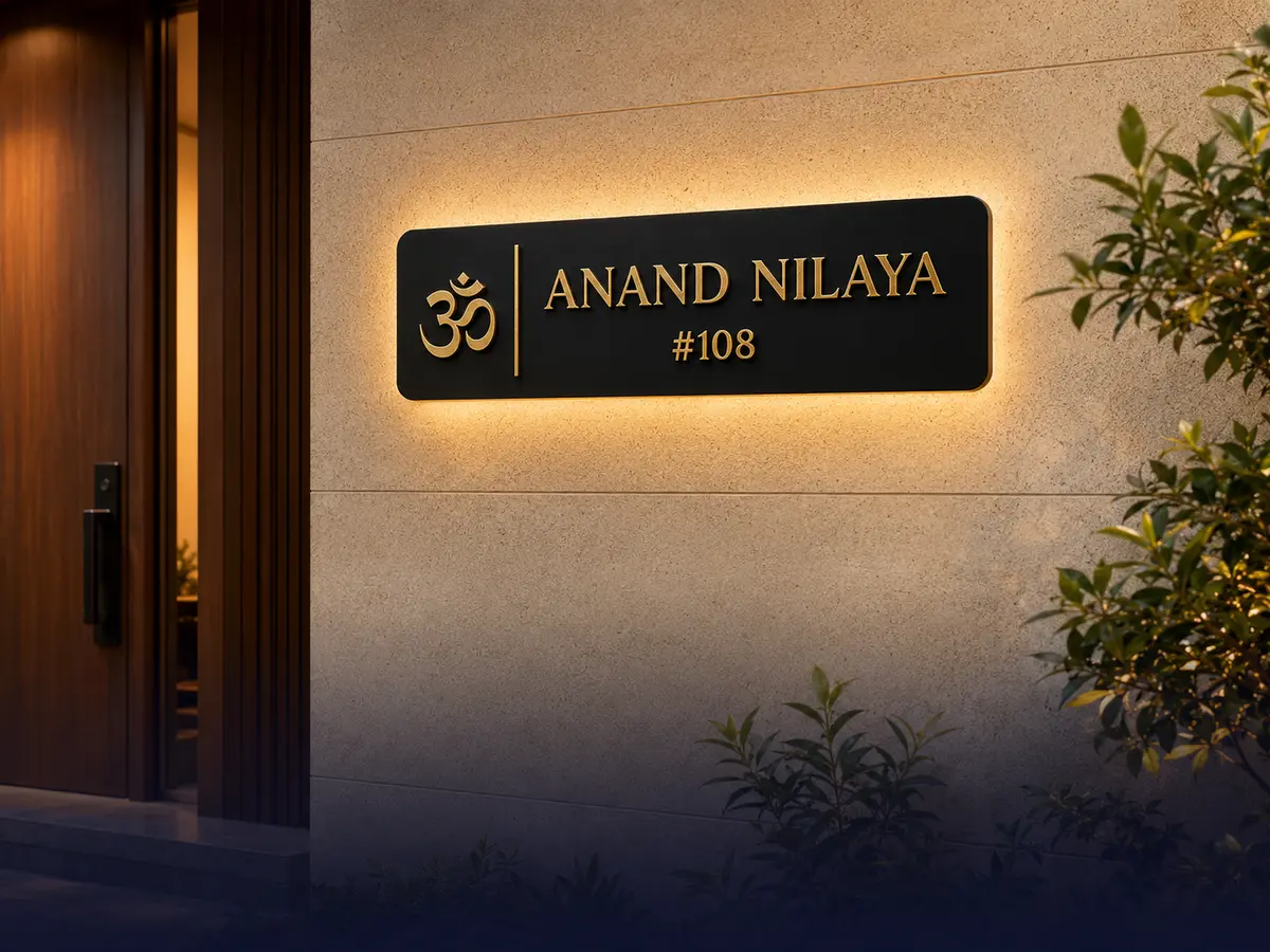 Premium black and gold acrylic villa name plate installed at a Bengaluru home