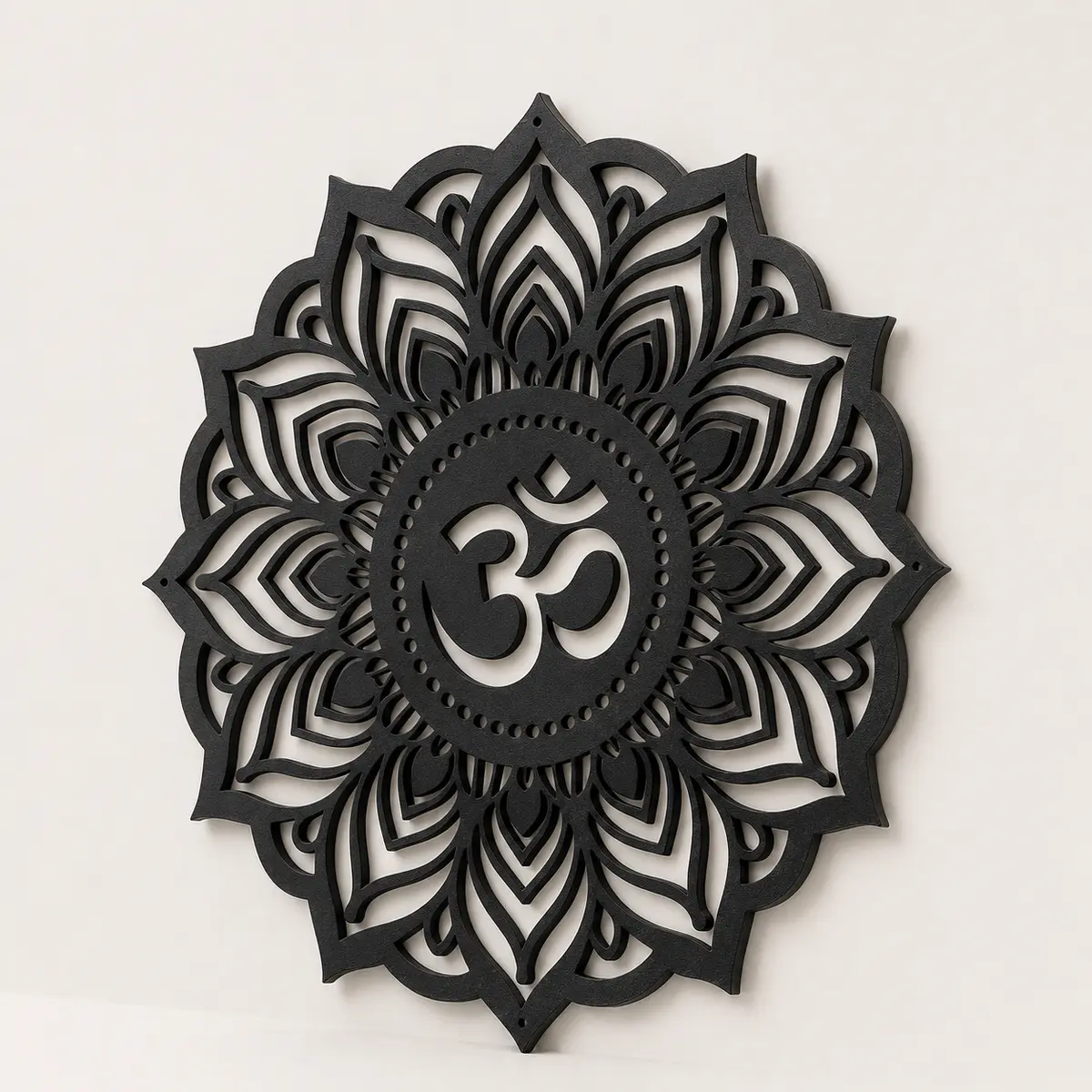 Black Om Mandala MDF wall art shown at an angle with visible MDF thickness