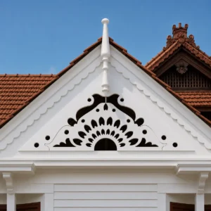 Temple Crown Floral white PVC CNC-cut gable jaali installed on a Kerala-style tiled roof