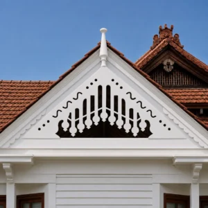 Traditional Spire white PVC CNC-cut gable jaali installed on a Kerala-style tiled roof