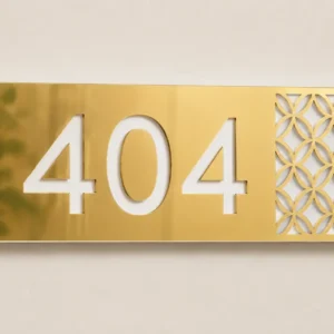 Gold Mirror Lattice Acrylic Apartment Number Plate showing custom number 404 and two centre studs