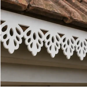Floral Fan Lace CNC PVC Roof Border close-up under roof tiles showing thin CNC-cut PVC foam board
