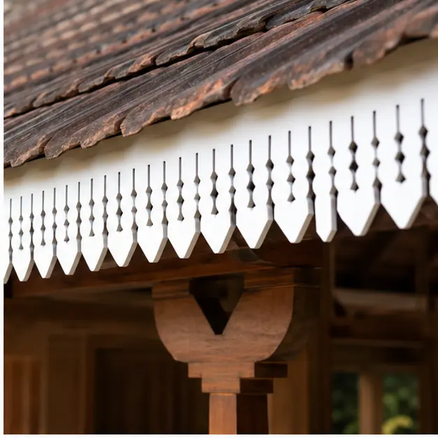 Diamond Step Lattice CNC PVC Roof Border close-up under roof tiles showing thin CNC-cut PVC foam board