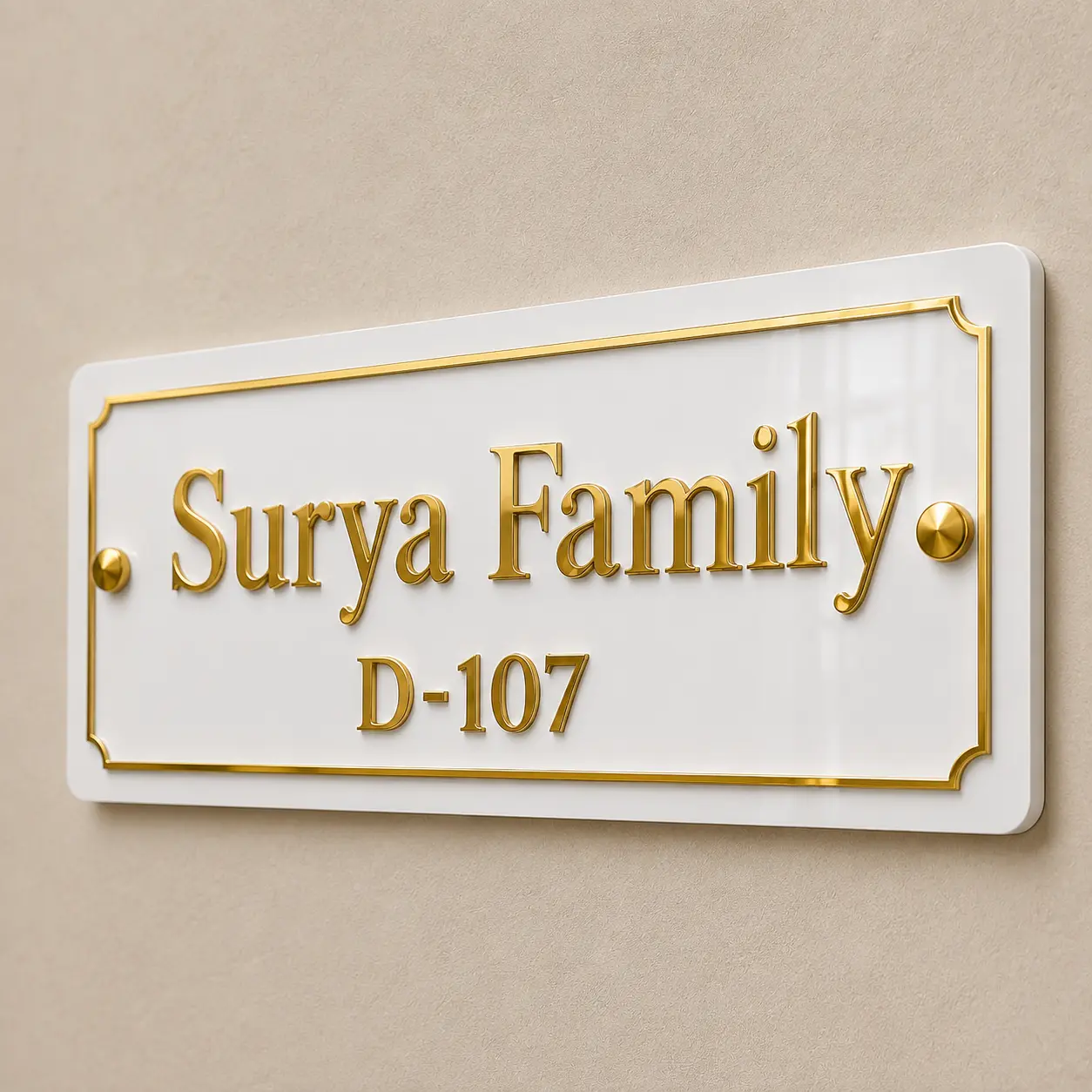 Angled view of layered white and gold mirror acrylic name plate