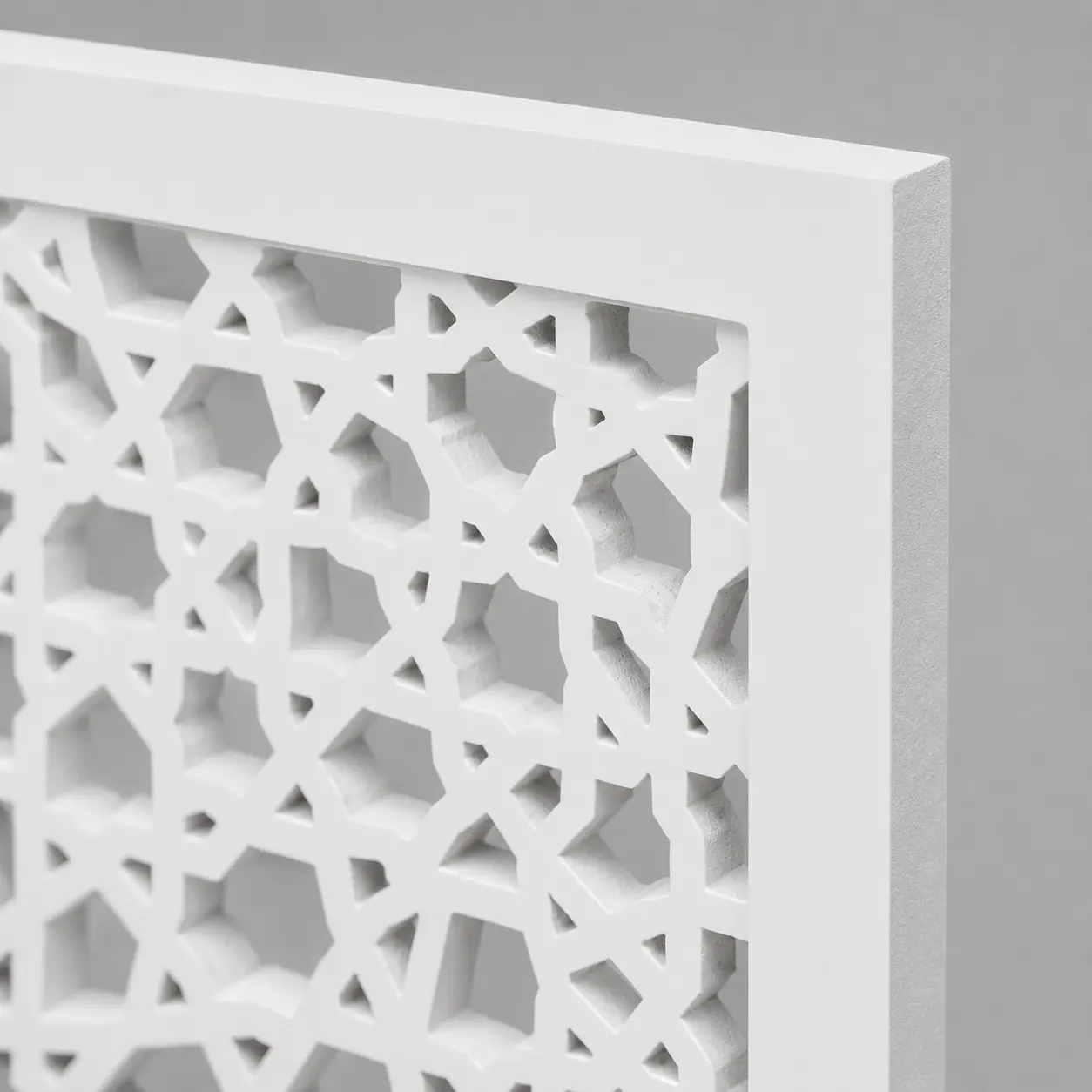 Close-up of Moroccan Rosette Mesh CNC-cut pattern in white PVC foam board