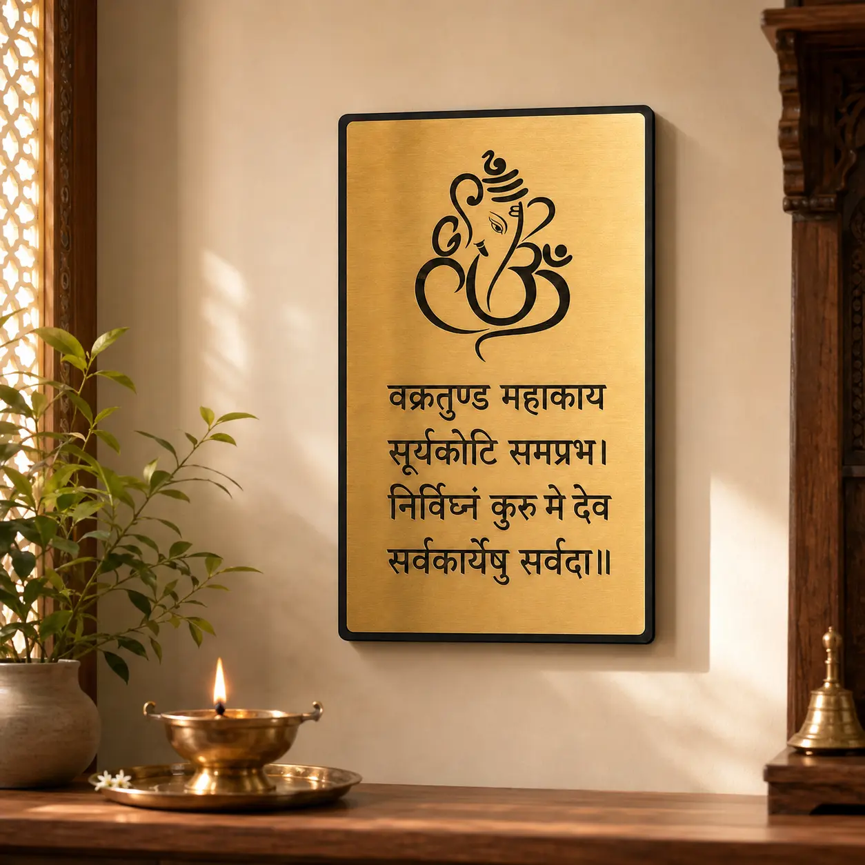 Ganesha mantra plaque installed in a pooja room
