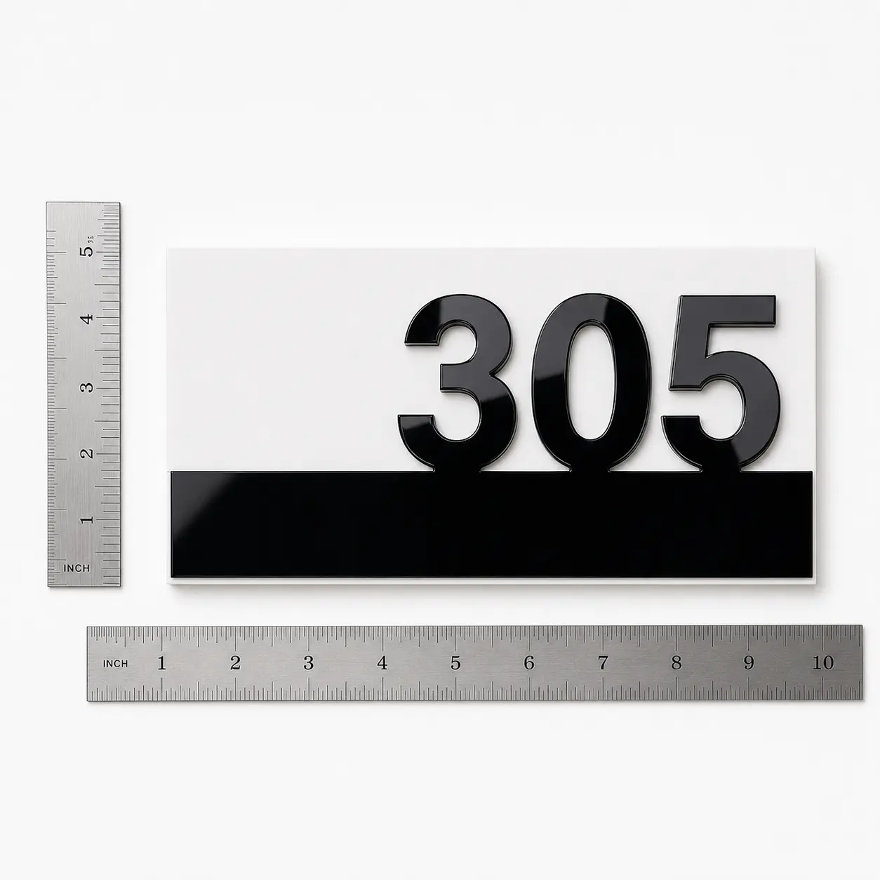 5 × 10 inch white and black acrylic door number plate shown with rulers