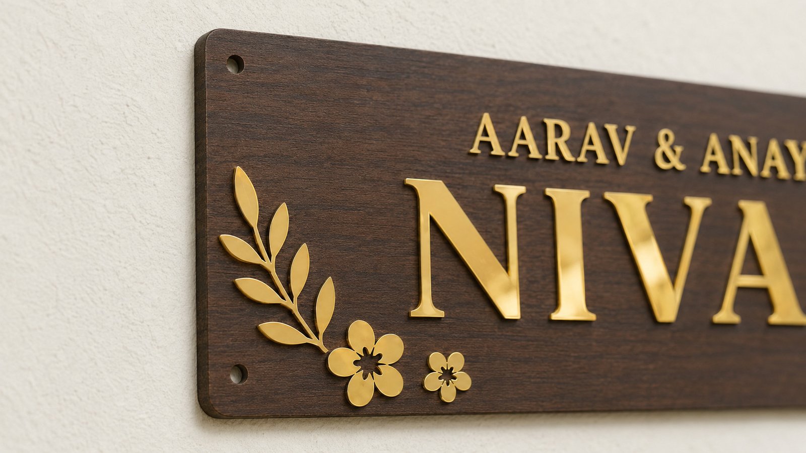 Close-up of the slim laser-cut 3 mm walnut ACP edge and gold mirror acrylic lettering