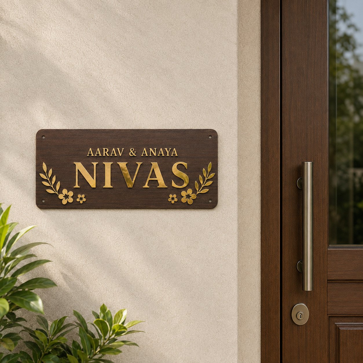 Walnut ACP and gold mirror acrylic family name plate displayed beside a modern entrance