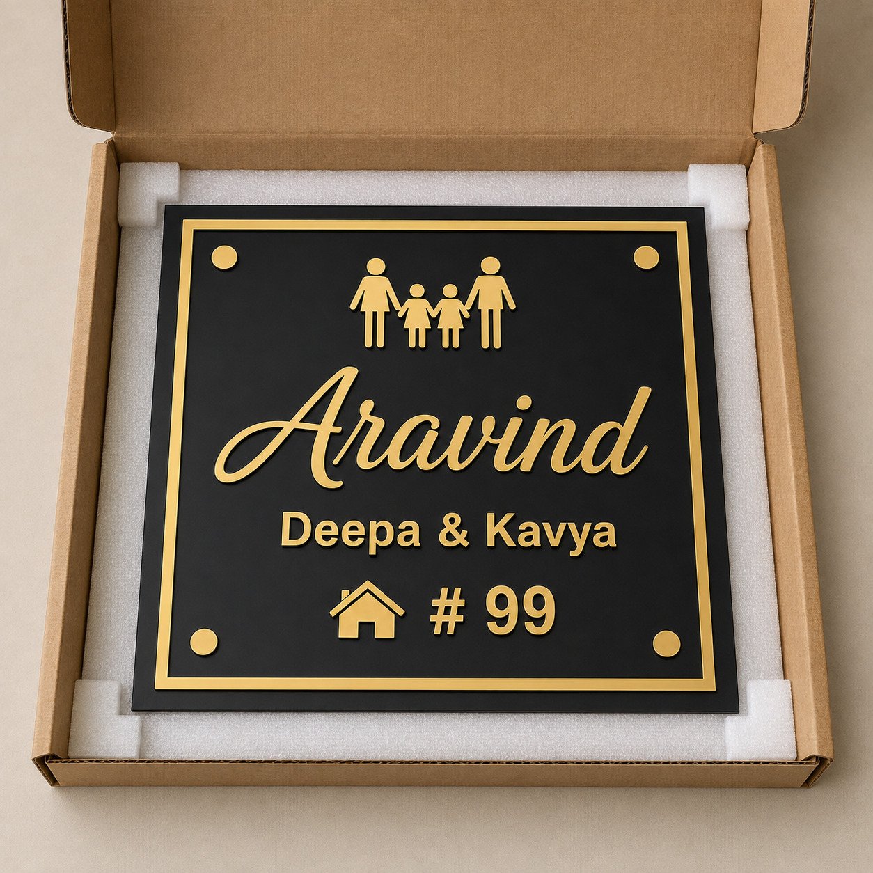 Square black and gold acrylic family name plate packed securely for delivery