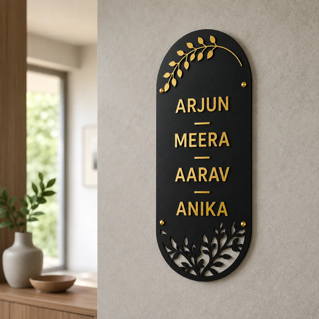 Personalised black and gold four-name acrylic plaque installed on an indoor entrance wall