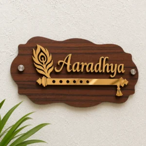 Custom Aaradhya walnut ACP gold mirror acrylic peacock feather and flute house name plate, 8 × 16 inch front view