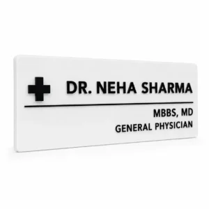 Custom doctor name plate for clinic with white acrylic backing, black lettering and medical symbol