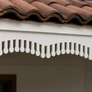 Close-up of T-1 Oval Drop Wave CNC PVC Roof Border showing white PVC foam board and sharp CNC-cut edges